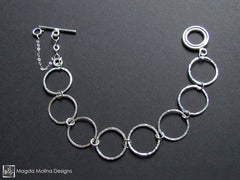 The Hammered Silver Rings Bracelet