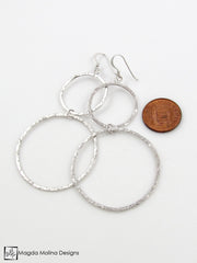 The Large Hammered Silver Double Hoop Earrings