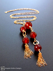 The Delicate Gold Tassel And Carnelian Lariat Necklace