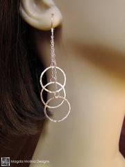 The Multiple Hammered Silver Rings On Chain Earrings