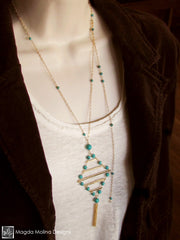 The Long Turquoise And Gold Diamond Shaped Necklace With Tassel