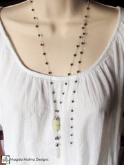 The Long Silver & Hematite Necklace With Large Yellow Turquoise And Tassel