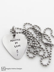 The "POWERED BY LOVE" Hand Stamped Omnisex Guitar Pick Necklace