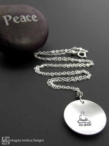 The Hand Stamped Silver Buddha And Peace Necklace