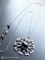 Silver Flower Necklace with Hematite Accent