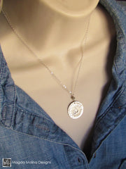 The Hand Stamped And Hammered Silver OM Necklace